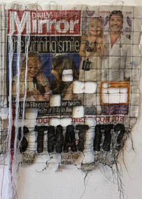 stitching into newspaper, featuring the text 