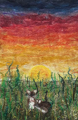 Mice in a field at sunset, picture made from felt.